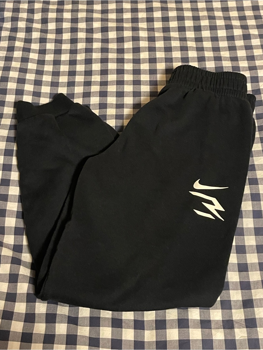 Nike Black Sweatpants with White Swoosh and Graphic